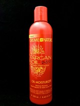 An item in the Health & Beauty category: CREME OF NATURE ARGAN OIL OIL MOISTURIZER RESTORE MOISTURE HEAT PROTECTANT 8.45o