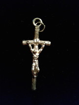 Crucifix Pendant ,  - $5.00