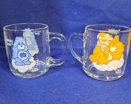 Set of 2 Vintage 1984 Care Bears Funshine &amp; Grumpy Bear Glass Mugs Cups - £33.43 GBP