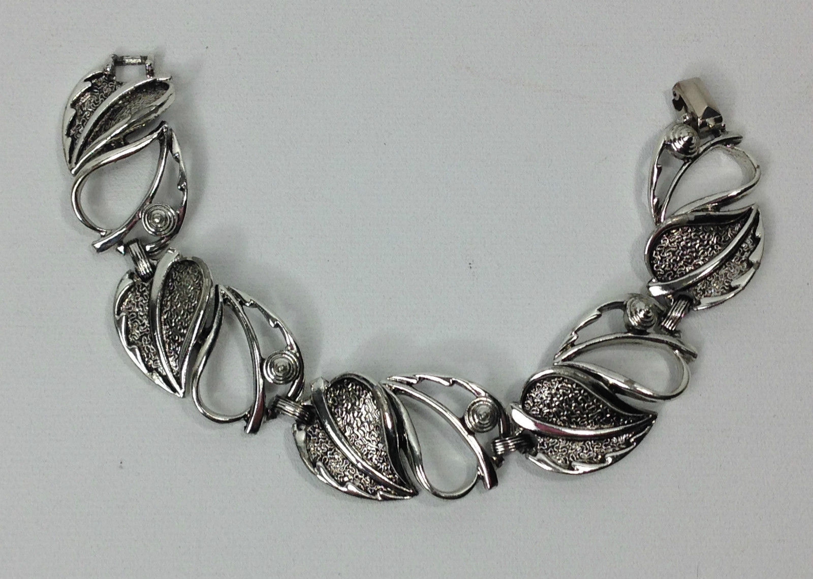 Buy the Vintage Silver Tone Crown Trifari Pin & Sarah Coventry Bracelet  75.8g | GoodwillFinds