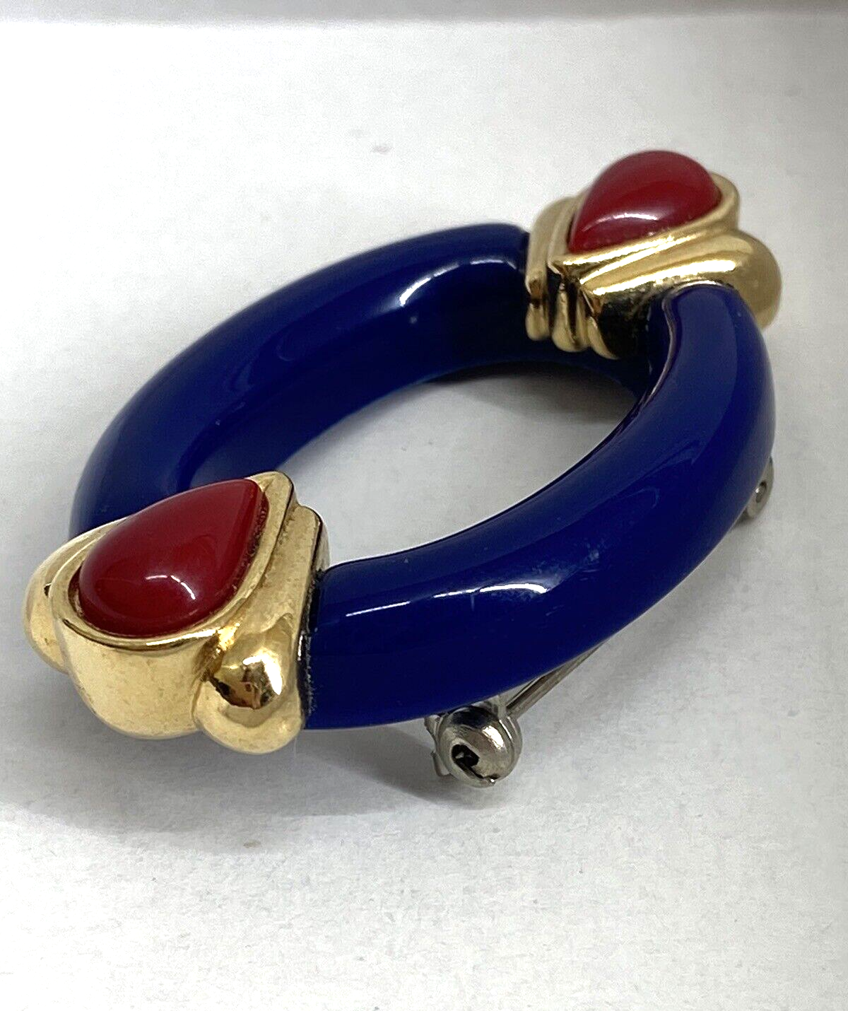 Primary image for Vintage 1980s Avon 2" Blue Red Teardrop Gold Trim Oval Plastic Brooch Pin