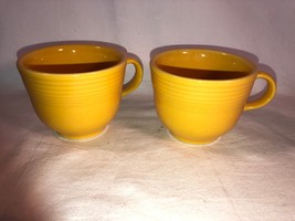 2 Yellow Fiesta Tea Cups Mint - $7.99