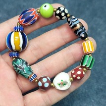 Vintage african venetian style glass with afghani big brass beads bracelet - $490.64 MXN