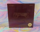The Carpenters - The Singles 1969-1973 (Record, 2020) Coke Bottle Clear New - £25.40 GBP