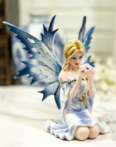 Ebros Frozen Blonde Frost Flake Wings Fairy Holding Spring Flowers Figurine - £30.29 GBP
