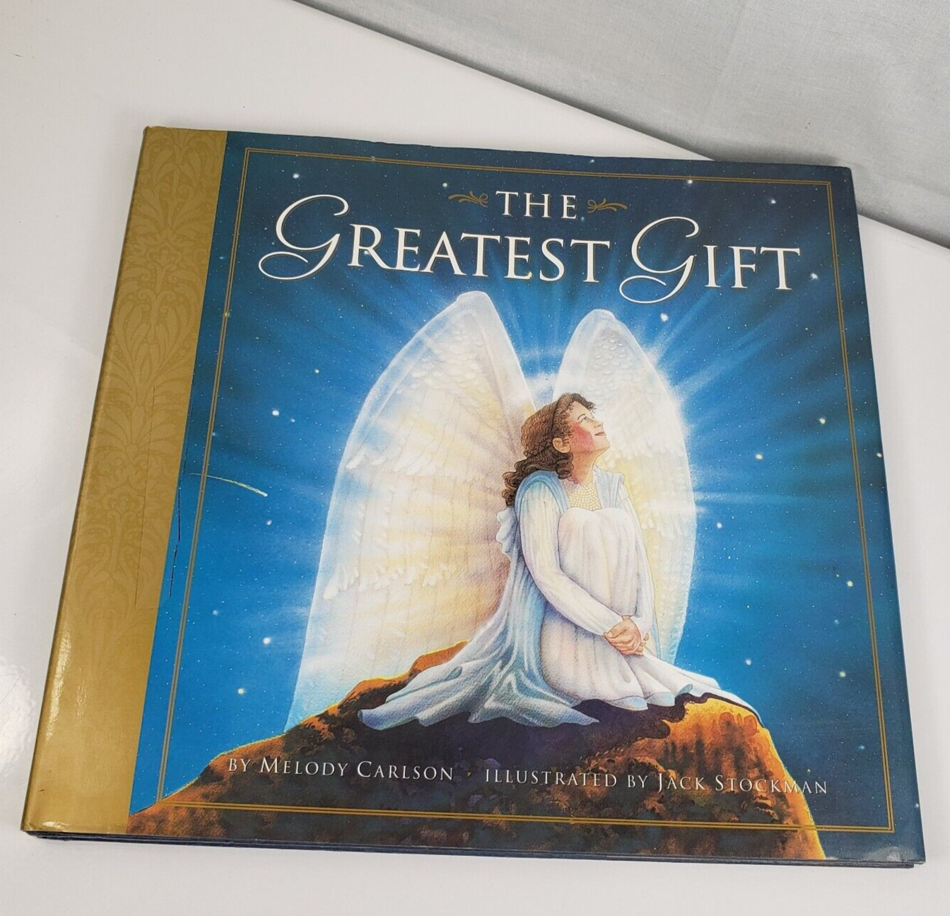 The Greatest Gift: A Christmas Story by Carlson, Melody Harbook Dust Cover - $14.56