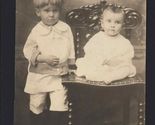 SNAPSHOT from ALBUM * Studio Real Photo Postcard Brothers little one on ... - $8.86