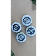 1998-2001 Nissan Frontier SILVER Wheel Center Cap 40315-8B400 OEM 4 SET - $2,351.21 MXN