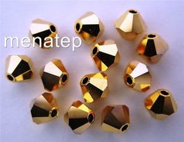 5 6 mm Swarovski Crystal Bicones - Aurum 2x(Please read item description) - £1.93 GBP