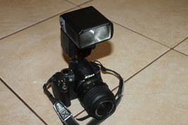 Nikon D3000 10.2MP Digital SLR Camera with lens and sigma ef-500 flash o... - £148.72 GBP