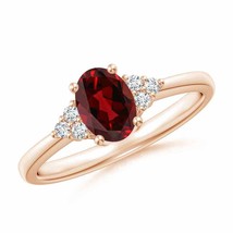 ANGARA Solitaire Oval Garnet Ring with Trio Diamond Accents in 14K Gold - £717.54 GBP