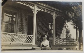 RPPC Sweet Couple Seated on Porch Lovely Home Unique Railings Postcard R1 - £5.47 GBP