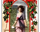 Christmas Greetings Woman In Archway Holly Poinsettias DB Postcard R10 - $6.88