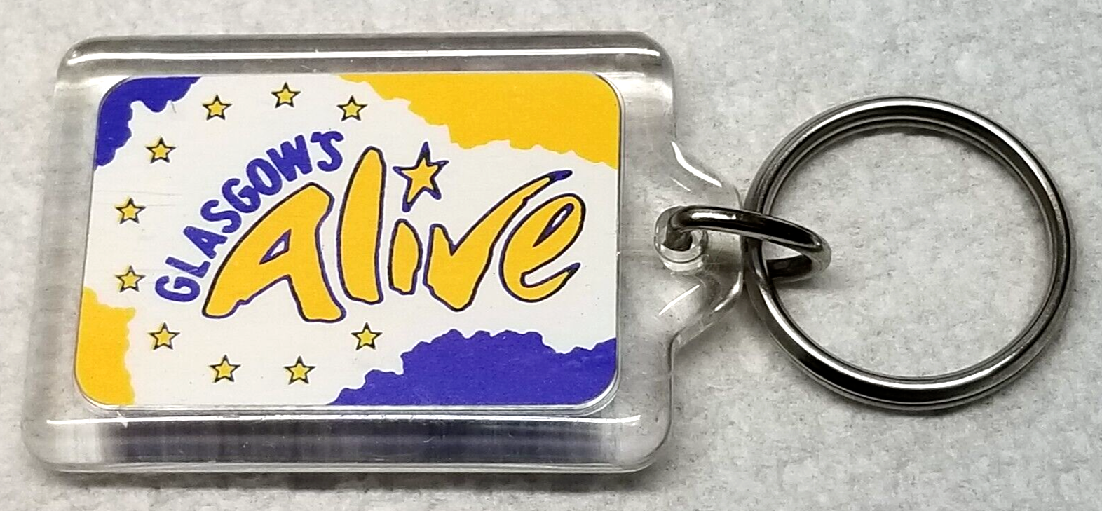 Primary image for Glasgow's Alive Keychain Blue Yellow Stars Plastic 1990s