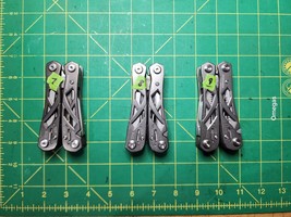 Gerber Suspension x3 #7 8 and 9.  maybe dirty, needs oil, used, but not broken - $74.25