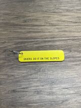 Vintage Skiers Do It On The Slopes Keychain Yellow Snow Winter KG JD - $9.89