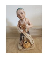 Vintage Porcelain Fisherman Figurine Holding Fish 6 1/4 High - $12.22 CAD