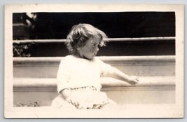 RPPC Cute Little Girl All Dirty After The Chores Resting On Steps Postcard Q25 - $9.95