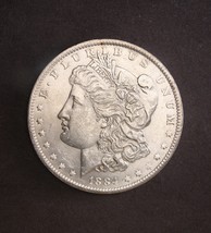 1884-O *Brilliant Uncirculated* Morgan Silver Dollar ( Full Breast Feathers ) - £42.15 GBP