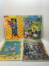 Lot of 4 tray frame puzzles Superman Zoo Crew Wizard of Oz Looney Tunes - $18.95