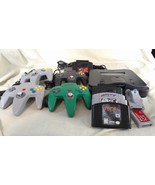 Nintendo 64 Bundle 3 GAMES 4 Controllers Rumble Pak Game Shark x2 TESTED... - $3,736.22 MXN