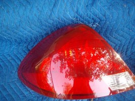 2000 2001 2002 2003 FORD TAURUS LEFT TAILLIGHT OEM USED - £107.96 GBP