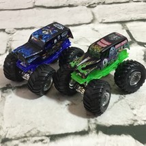 Hot Wheels Monster Trucks Lot Of 2 Grave Diggers Blue Green - $15.84