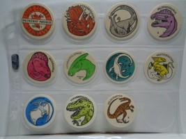 Dinosaurs  lot of 11 different milkcaps pogs tazos 1996 - $10.89