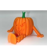Articulated Scary Pumpkin Buddy – Poseable Halloween Pumpkin Figurine - $128.72 MXN