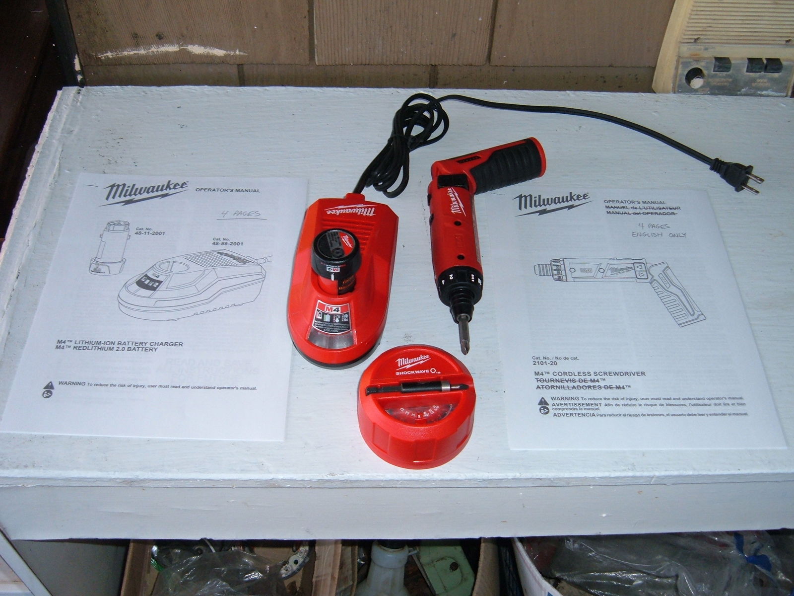 Milwaukee 2101-20 M4 used 2-speed cordless screwdriver & battery, charger & bits - $141.00