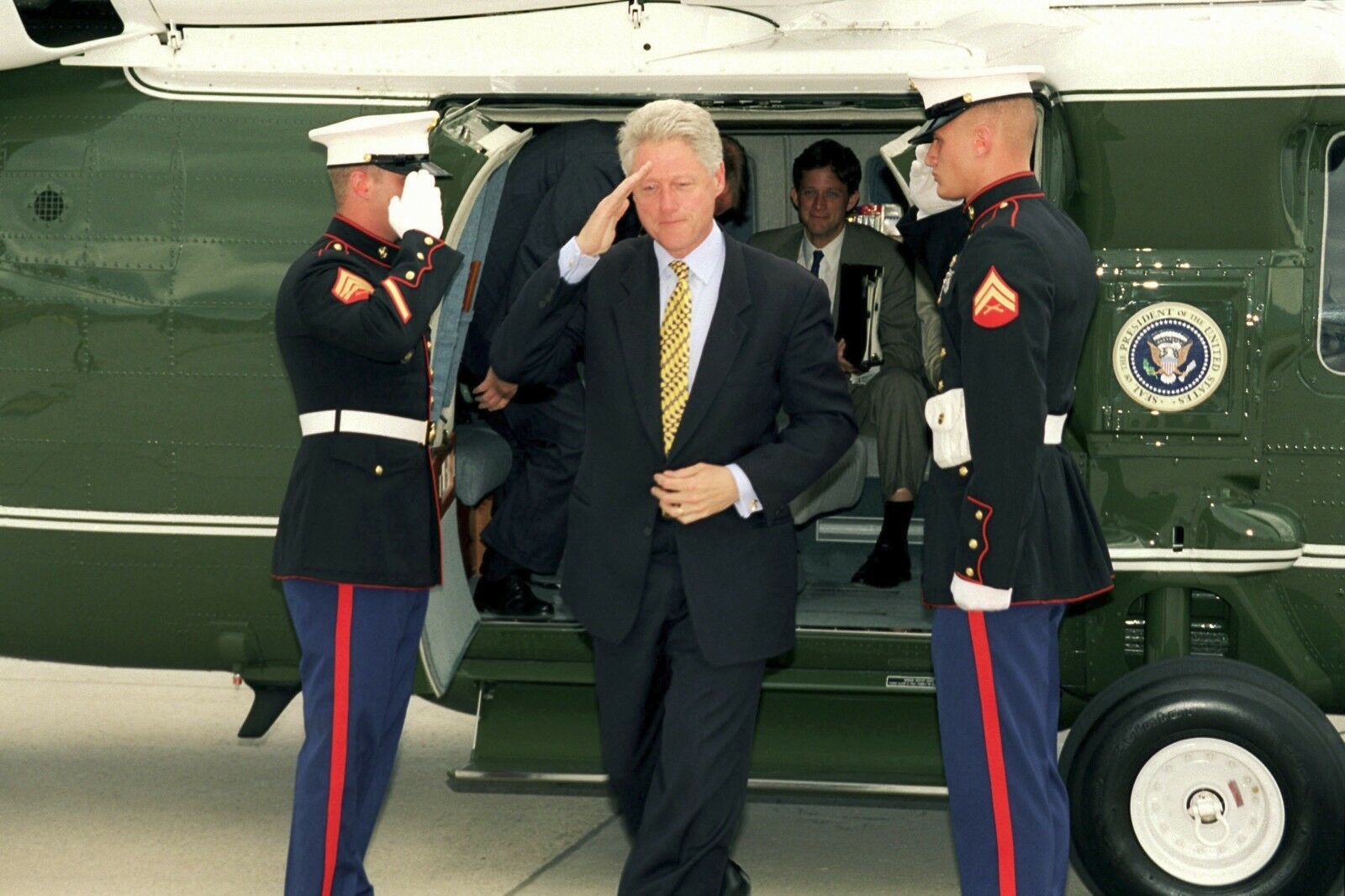 President Bill Clinton salutes as he departs Marine One helicopter Photo Print - $8.81 - $14.69