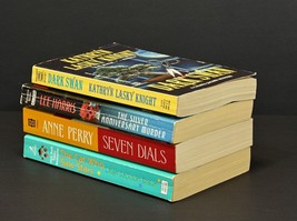 4 used paperback books - mystery - £8.40 GBP