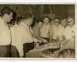 Group of Menu Looking at A Control Panel as Man Pushes Button B&amp;W Photo  - £14.00 GBP
