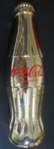 Coca-Cola  Gold Bottle in Red Velvet Bag 8oz size  Lots of Black Specks - £3.58 GBP