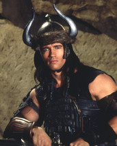 Arnold Schwarzenegger in Conan the Barbarian wearing horned helmet 16x20 Poster - £15.97 GBP