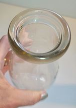 ONE PINT MILK BOTTLE EMBOSSED WITH 7 MINN SEALED 52 LC image 5