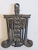 Vintage Cast Iron Trivet Black Gray Retro Embossed Decorative Details Footed - £15.54 GBP