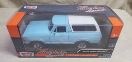Diecast 1/24 Scale 1978 Ford Bronco Motor Max Blue and White - $28.05