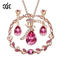 CDE Women Gold Jewelry Set Embellished with Blue Crystal Rose Necklace Earrings  - £76.02 GBP