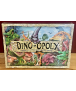Dino-opoly Dinosaur Dino Prehistoric Family Monopoly Board Game NEW SEALED - $478.30 MXN