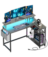 L-Shaped Desk with Power Outlets, LED Lights, and Monitor Stand - $90.94+