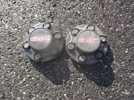 1996 to 1999 GMC 1500 2500 black 6 lug plastic bolt on center caps hubcaps - $51.08
