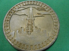 Great Collectible Cast Iron VINTAGE  Medallion ...OIL TOWER..FREE POSTAG... - £15.15 GBP
