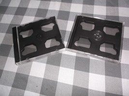 10.4MM SUPER SLIM 3 CD/DVD JEWEL CASE WITH BLACK CENTER TRAY (Ships Free) - $8.90