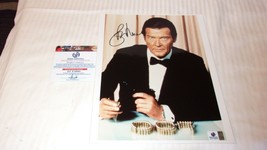 Roger Moore Signed James Bond Photograph In Tux With Gun 8x10 - $800.00