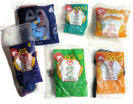6 McDonalds Happy Meal Toys in Package Genie, Claude the Crab, Sting Ray &amp; More - £19.61 GBP