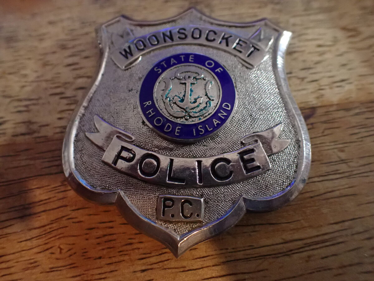 Woonsocket Rhode island police badge bx 9 - $149.99