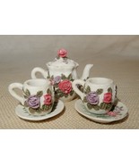 Adorable vintage miniature pottery child&#39;s tea set with garden roses design - $15.00