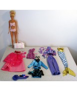 Ballet Barbie w/Blonde Hair, Blue Eyes, Plastic Body, Knees bend w/Outfits - $308.63 MXN