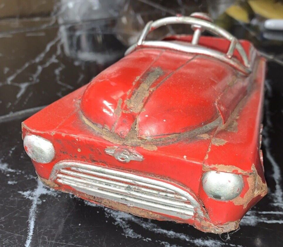 ? JOUSTRA ? VOITURE TOLE ROUGE ?? - $9.78